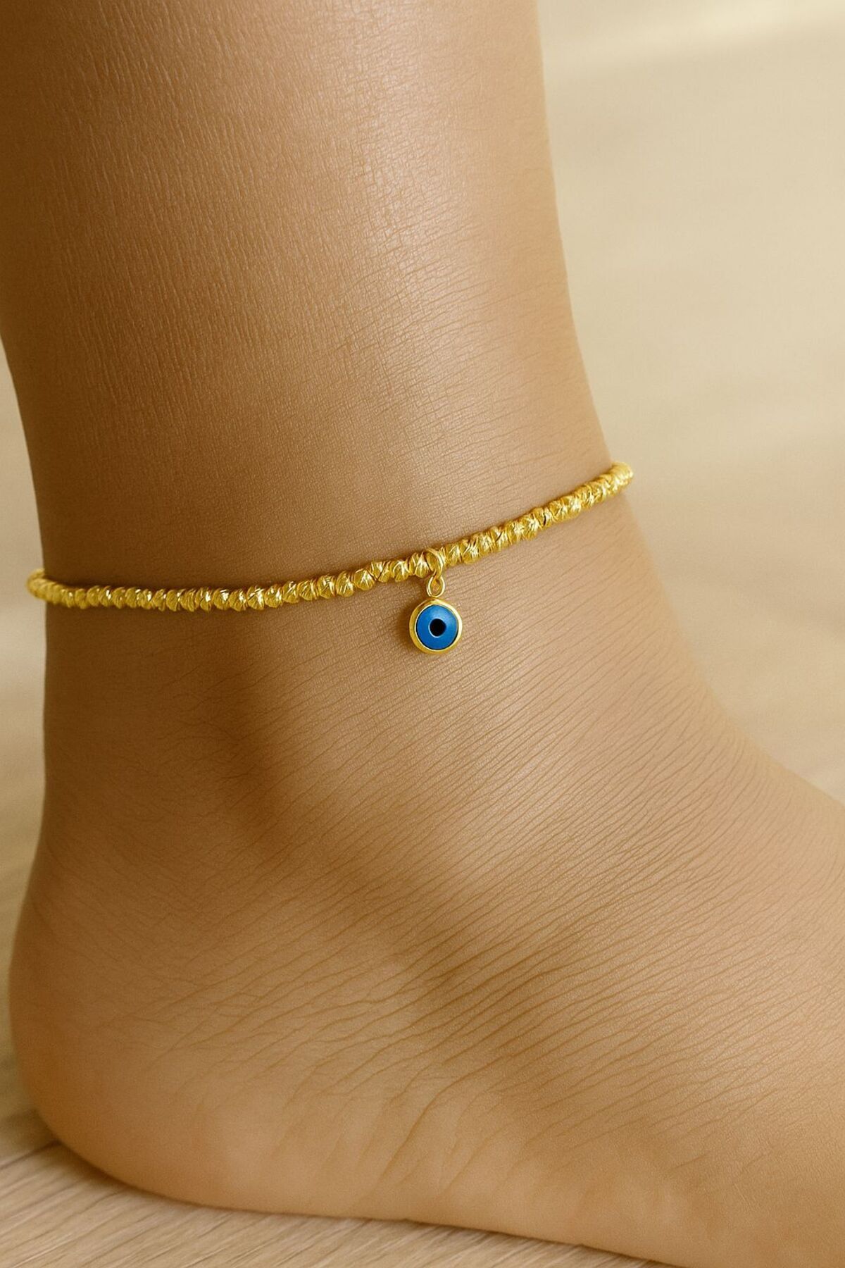 Zarif nazar boncuk detaylı burgu gold Çelik Halhal –